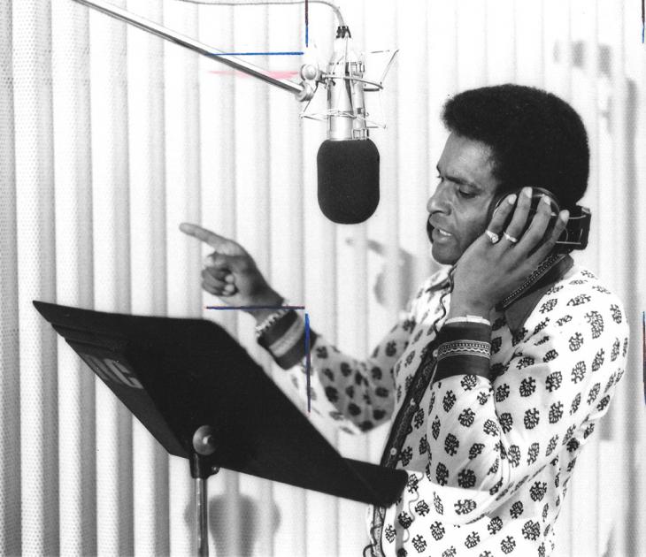 Groundbreaking country music star Charley Pride recording in the studio