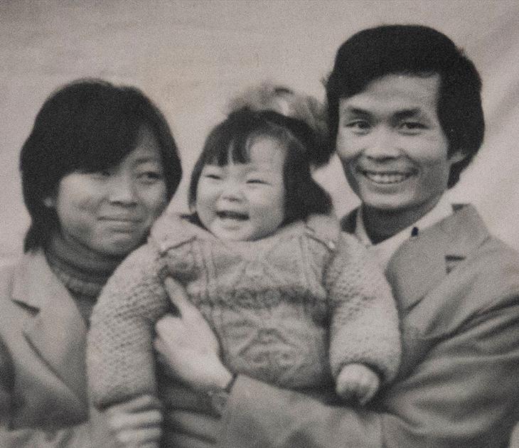 Nanfu Wang as a baby with mother Xaodi and father Qinhua